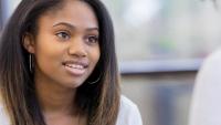 Young woman meets with doctor